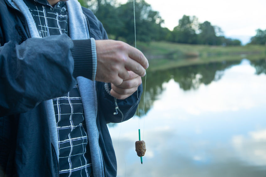 Man prepare lure to catch fish.